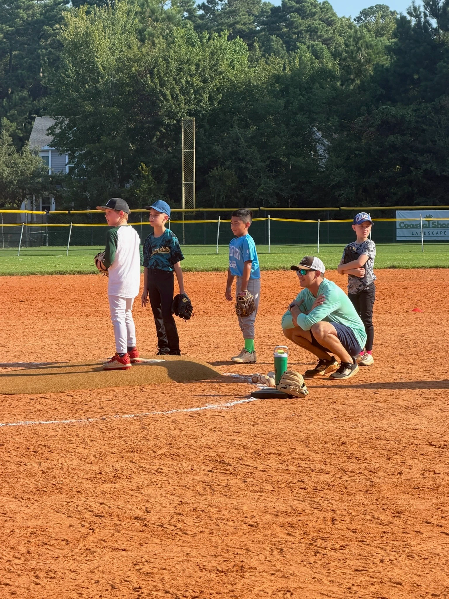 coach talking infield positioning